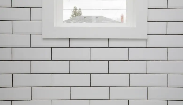 bathroom subway tiles with black grout