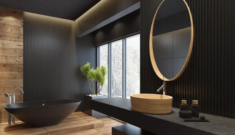 black bathroom remodel with wood flooring and large soaker tub