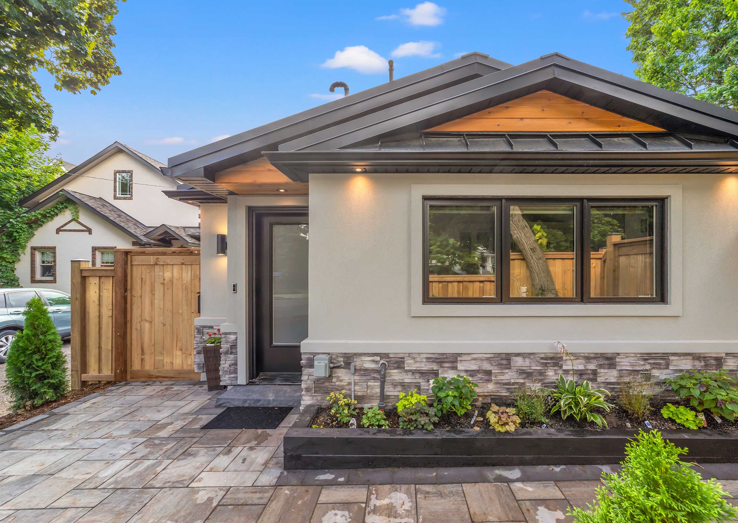 Exterior facade with stone landscaping, Weston Garden Suite